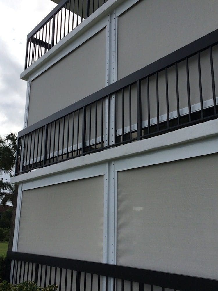 Hurricane Screens, strong vertical support beams with impact-resistant hurricane shutters