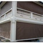 house with large brown hurricane shutters