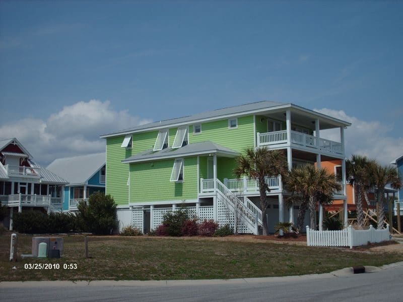 X - american hurricane shutters house with impact-resistant hurricane shutters