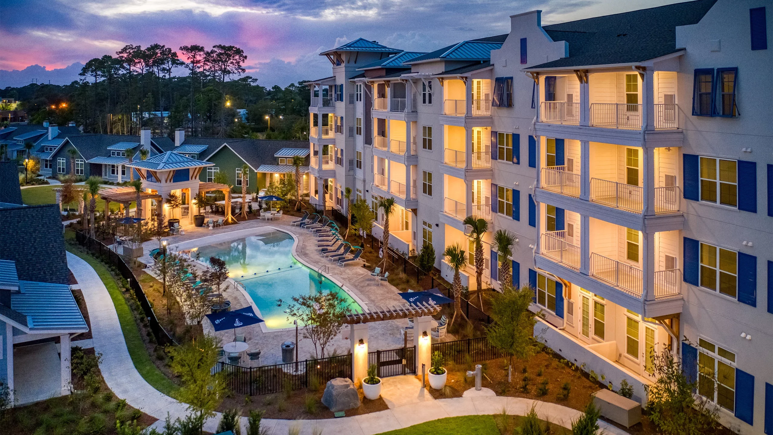 A modern residential complex, equipped with hurricane shutters