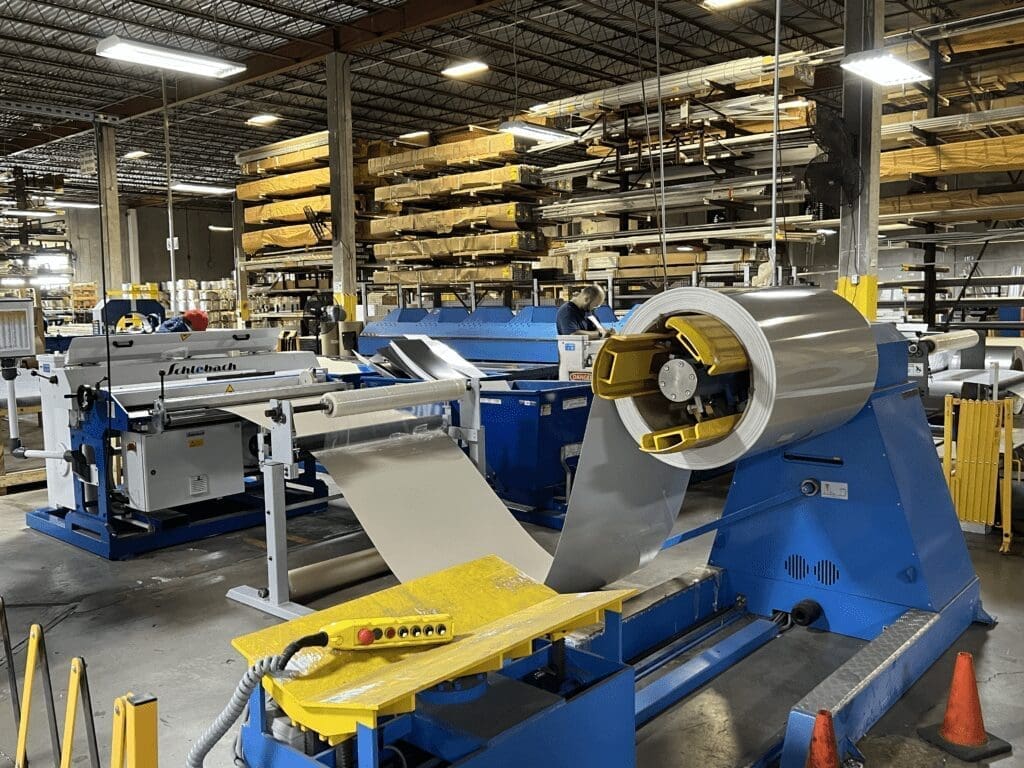 Industrial factory for impact-resistant hurricane shutters in either North or South Carolina