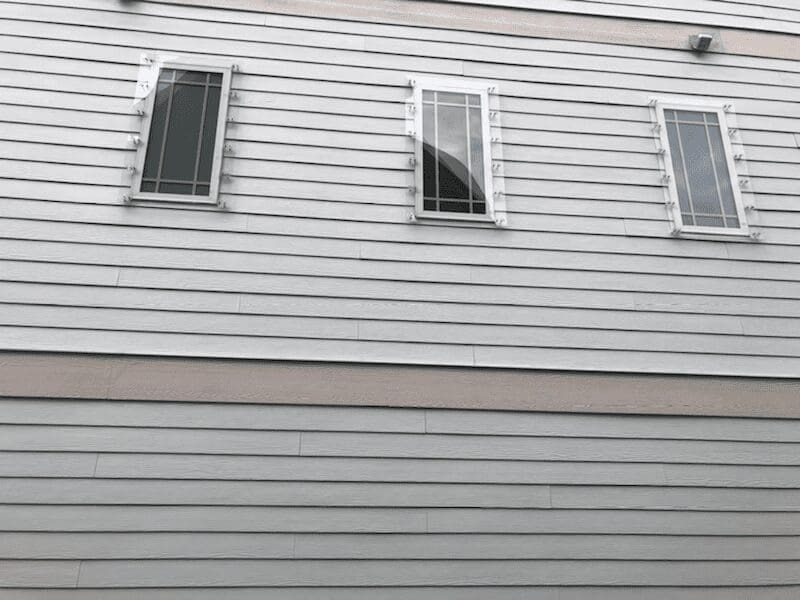 windows white hurricane shutters