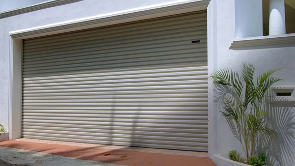 Modern light taupe roll-down hurricane shutters, Wilmington.