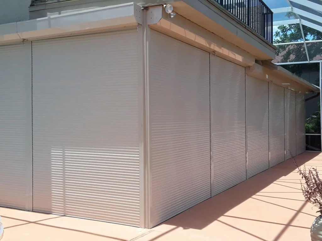 Beige roll-down hurricane shutters protect Myrtle Beach homes.