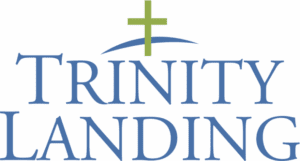 Trinity landing logo: a symbol of faith and welcome - american hurricane shutters Trinity Landing logo, blue green cross and arc. Hurricane shutters for Topsail, Wilmington.
